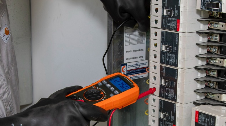 electrician using a Klein multimeter