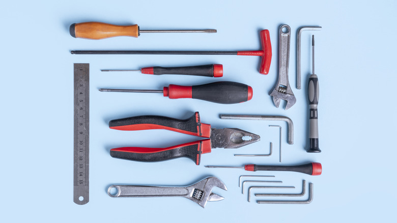 hand tools on blue background