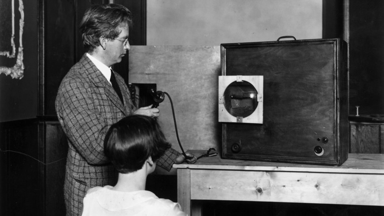 Baird showing an early model of his television equipment