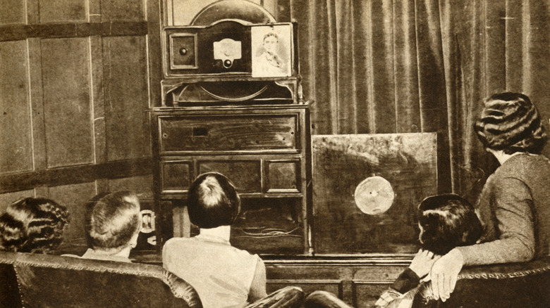 people watching a Baird TV in 1933