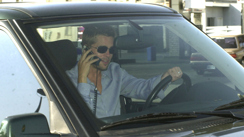 Brad Pitt using car phone