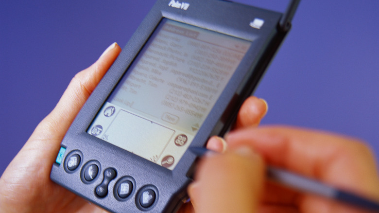 palm pilot being used