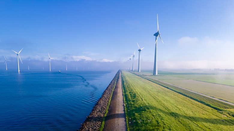 Wind turbines next to water
