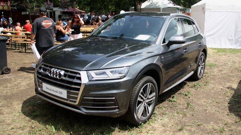 Black 2018 Audi Q5 parked on dirt