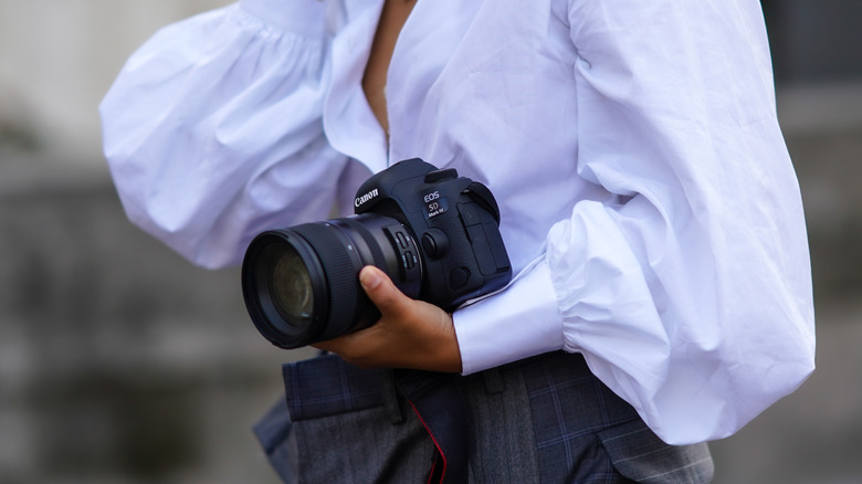 Woman holding camera