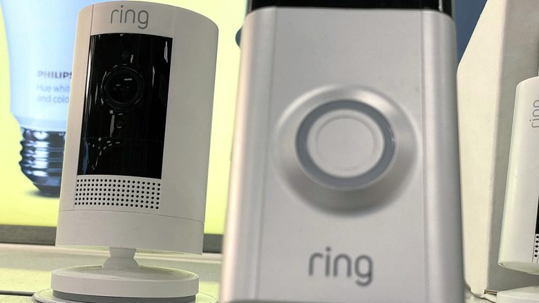 Ring brand security cameras displayed on a shelf at a Target store. 