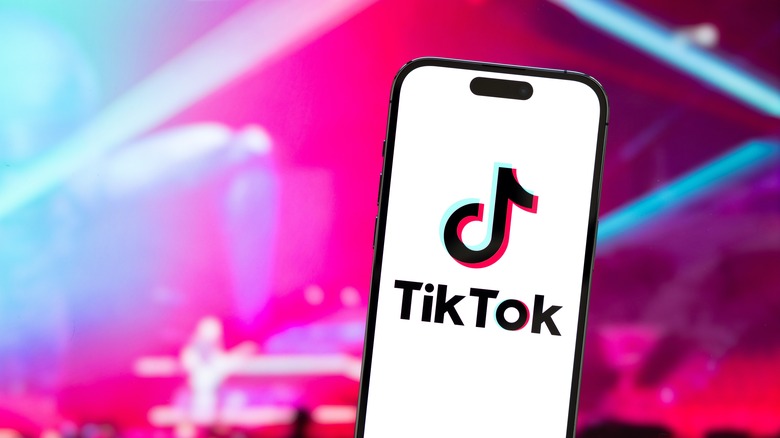 The TikTok logo on a mobile phone