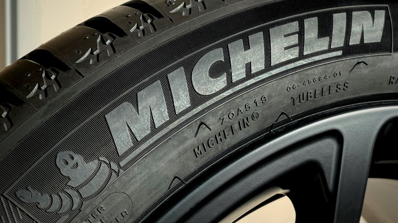 A close up of a Michelin tire with the company logo