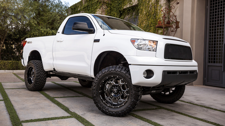 A white Toyota Tundra parked in a driveway