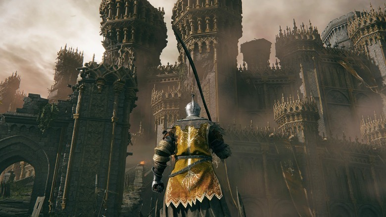 A knight standing before a castle in Elden Ring
