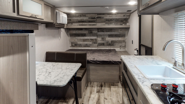 Promotional image of interior of Keystone Coleman camper