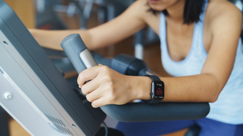 Person wearing an Apple Watch during a workout 