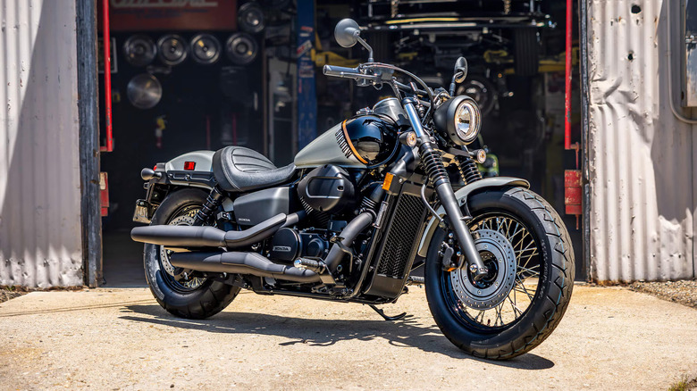 Honda Shadow Phantom in front of an auto shop