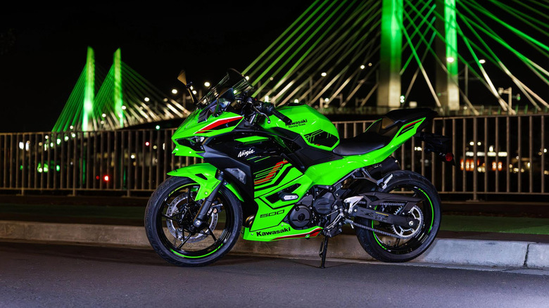 2024 Ninja 500 SE at night on a bridge