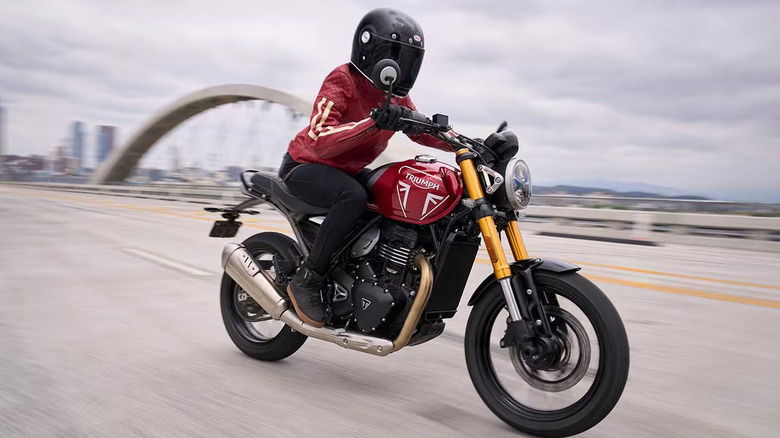 Rider on a Triumph Speed 400 on a freeway