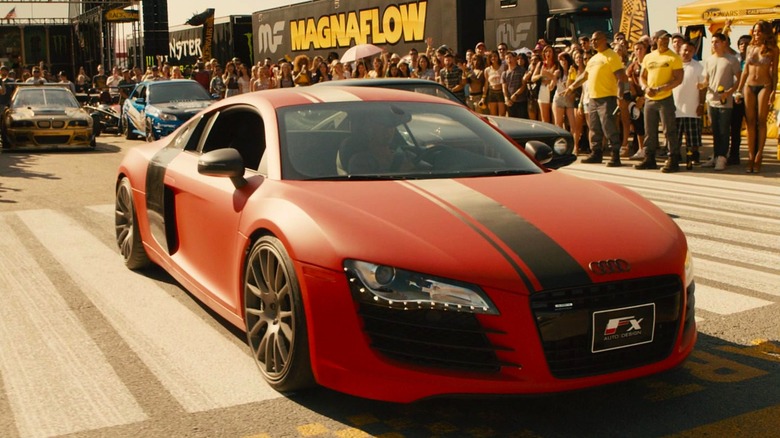 Audi R8 and Plymouth Barracuda in a race in Furious 7