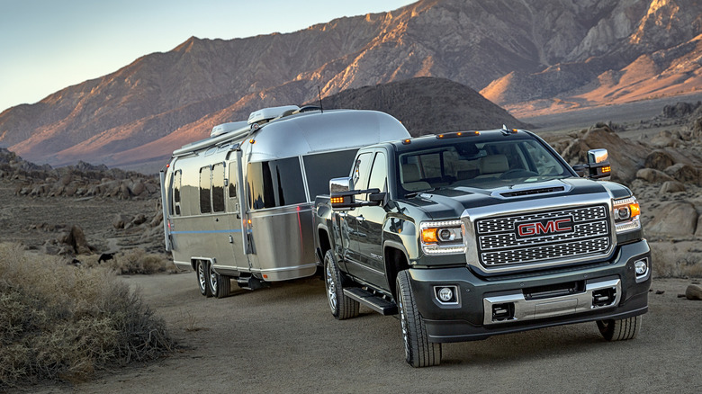 2018 GMC Sierra HD Denali towing a large trailer