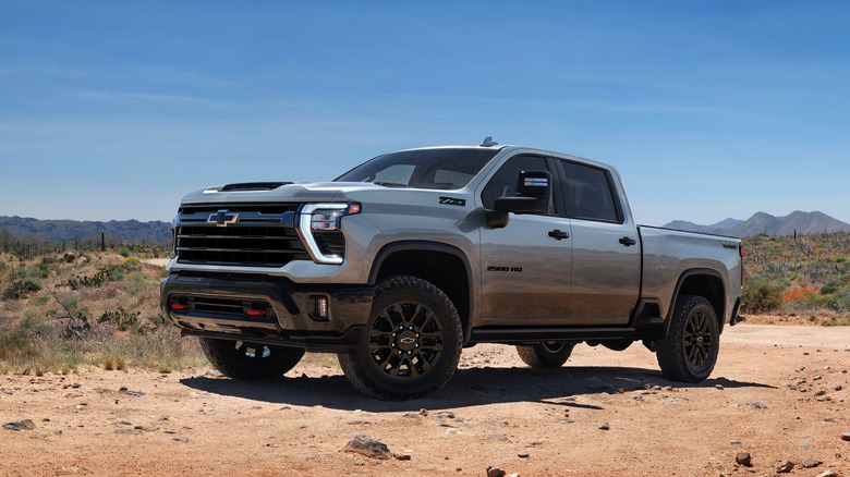 2024 Chevrolet Silverado HD on dirt front 3/4 view