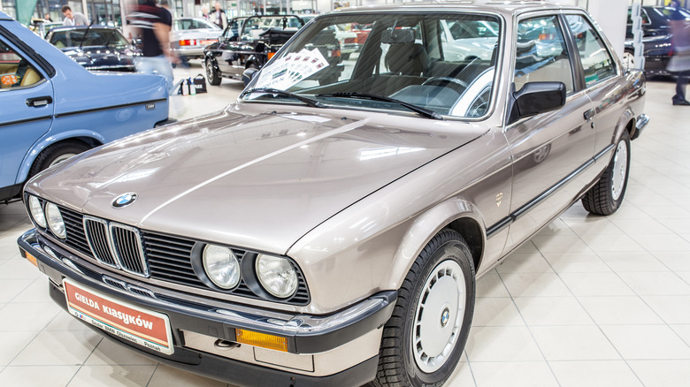 silver BMW 320i at car show 