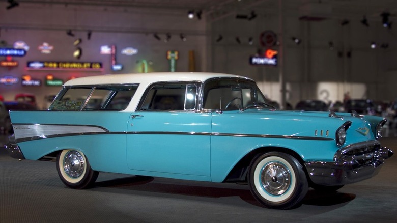 blue 1957 Chevy Nomad in garage side view