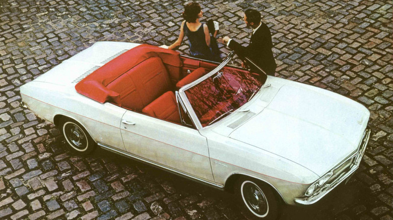 White Corvair convertible with red interior