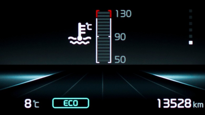 ECO mode light illuminated on instrument panel