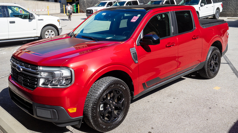 2022 Ford Maverick Lariat First Edition parked next to white Ford trucks