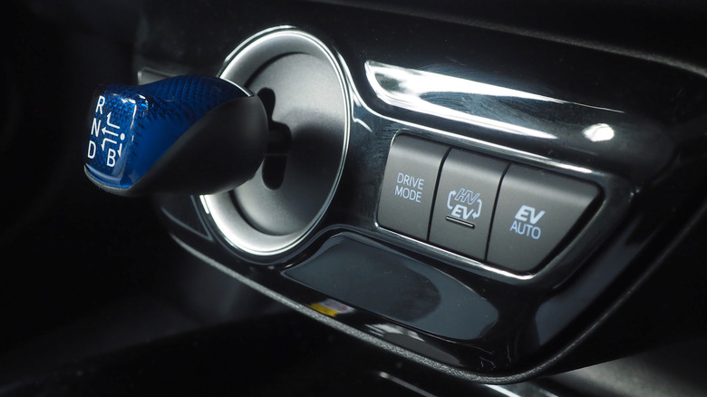 Transmission shifter and EV mode buttons