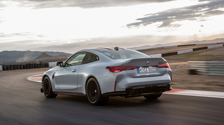 BMW M4 CSL rear 3/4 view on track