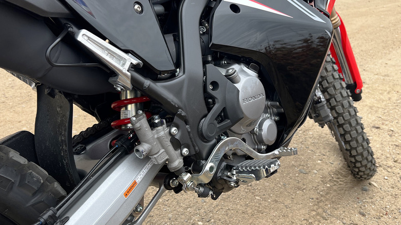 2023 Honda CRF300L Rally rear swingarm, brakes, and engine