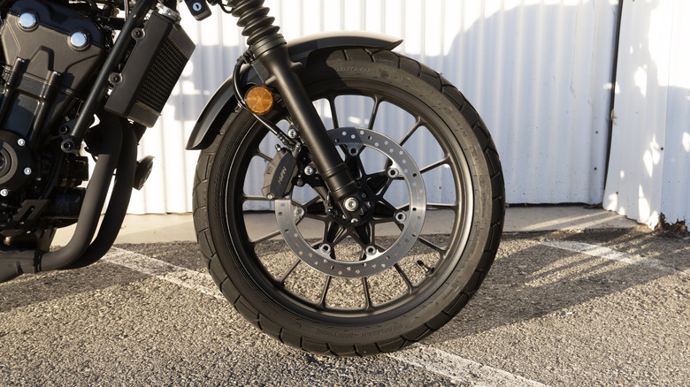 2023 Honda Scrambler front wheel, tire, and brake