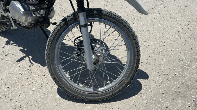 2023 Honda XR150L front wheel, tire, and disc brake