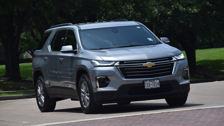 Silver 2024 Chevy Traverse outside 