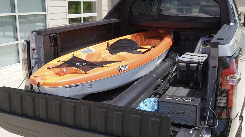 2024 Chevrolet Silverado RST First Edition holding a kayak in the bed