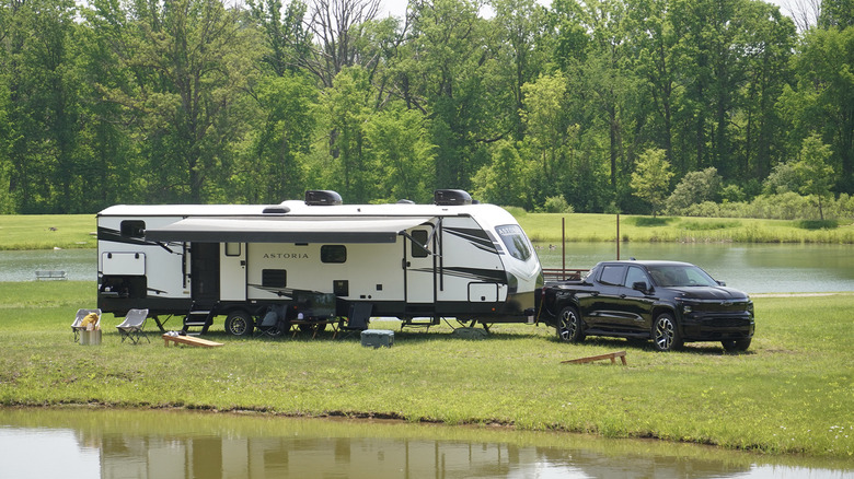 2024 Chevrolet Silverado RST First Edition towing an RV