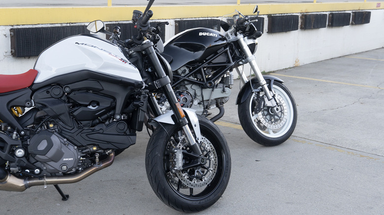 2024 Ducati Monster Plus and 2006 S2R 1000 side angle