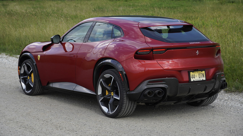 2024 Ferrari Purosangue rear three-quarters on a dirt road