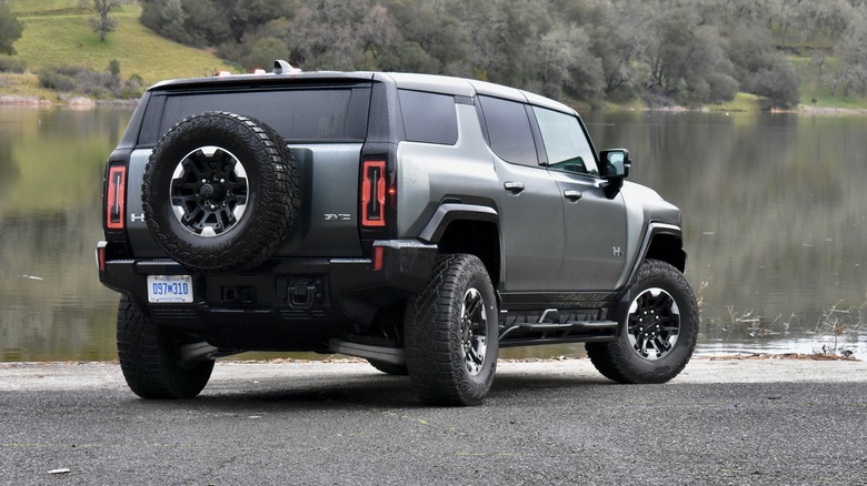 2024 GMC Hummer EV SUV rear three quarter view.