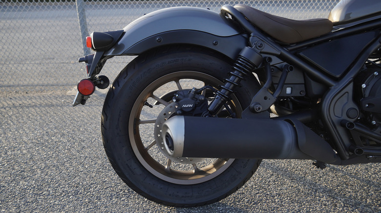 2024 Honda Rebel 500 rear wheel, exhaust, and suspension detail