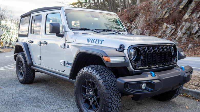 2024 Jeep Wrangler 4xe parked along mountain road