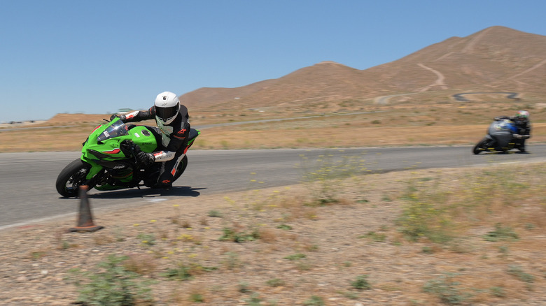 2024 Kawasaki Ninja ZX-4RR banking downhill at Streets of Willow