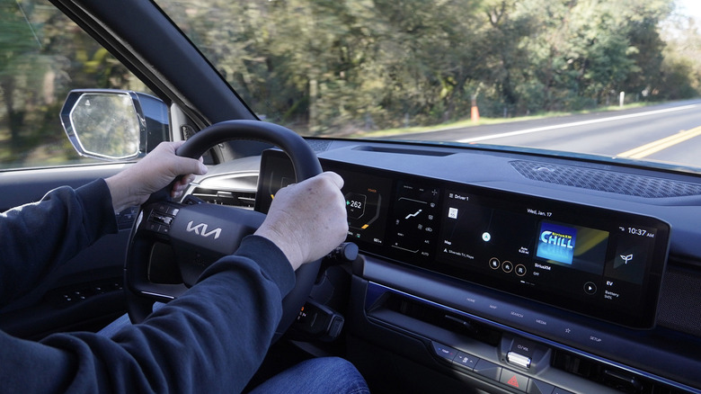 Kia EV9 driving shot from passenger seat