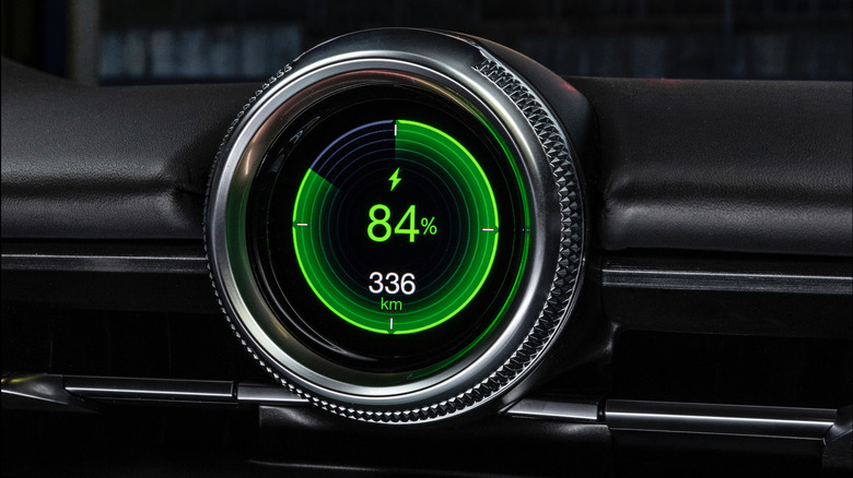 Maserati GranTurismo Folgore dash clock charge and range display