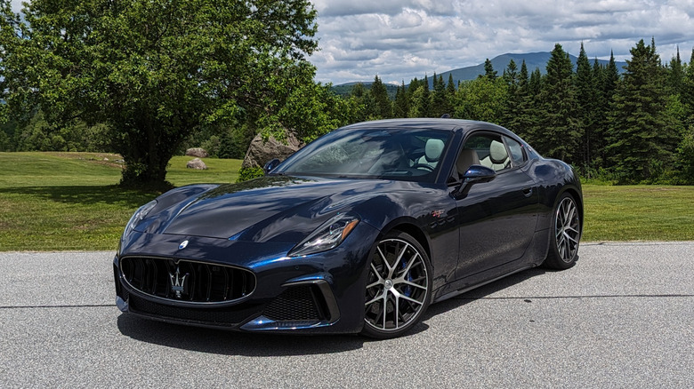 Maserati GranTurismo near a tree