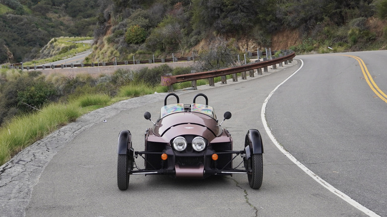 2024 Morgan Super 3 on a winding road in Malibu