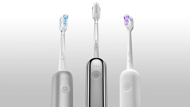 3 Laifen toothbrushes white background