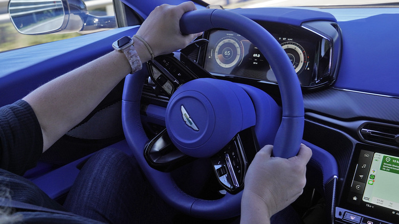 2025 Aston Martin Vanquish steering wheel in motion