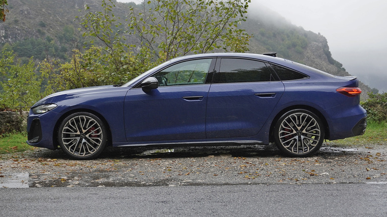 2025 Audi S5 Sedan side profile in the rain