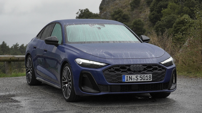 2025 Audi S5 Sedan front three-quarters in the rain