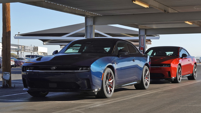 2025 Dodge Charger Daytona Scat Packs lined up in the pits